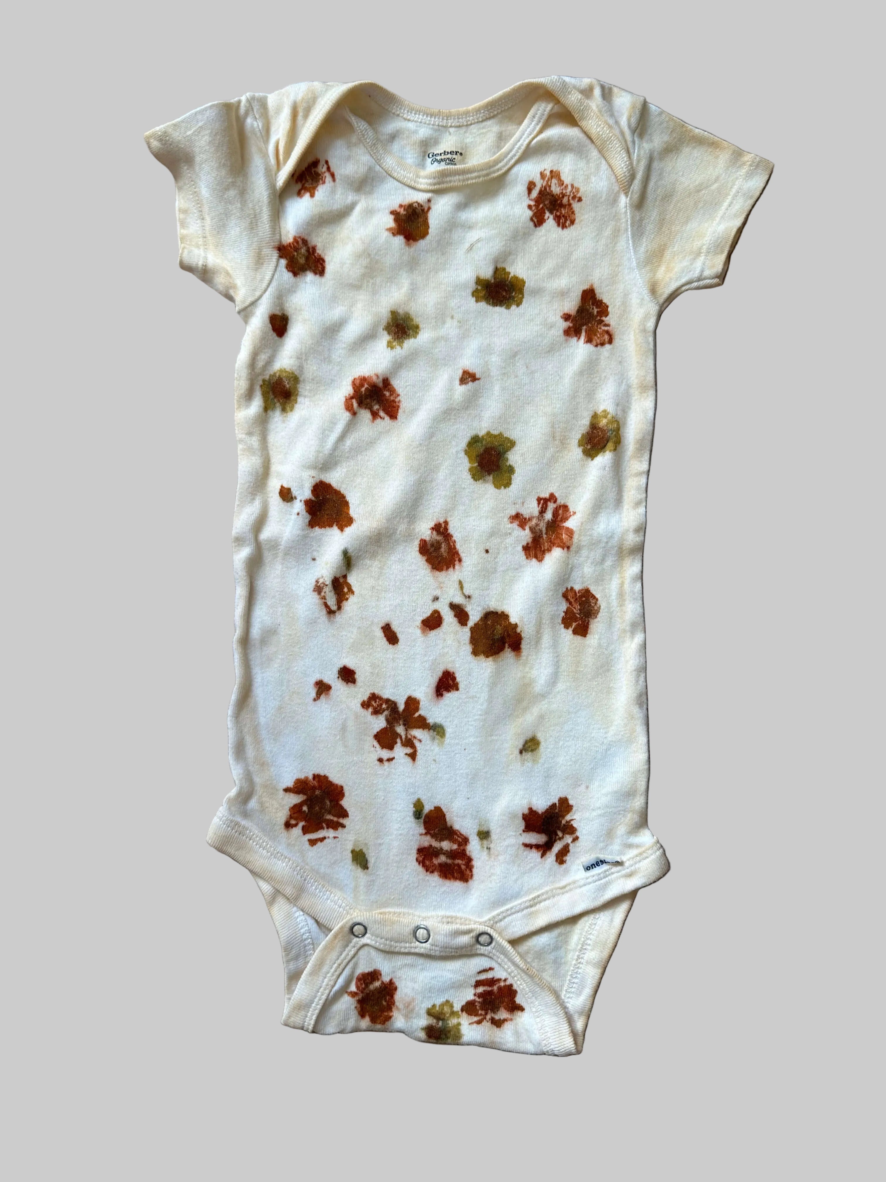 Baby Onsies Dyed With Marigolds and Coreopsis and Weld