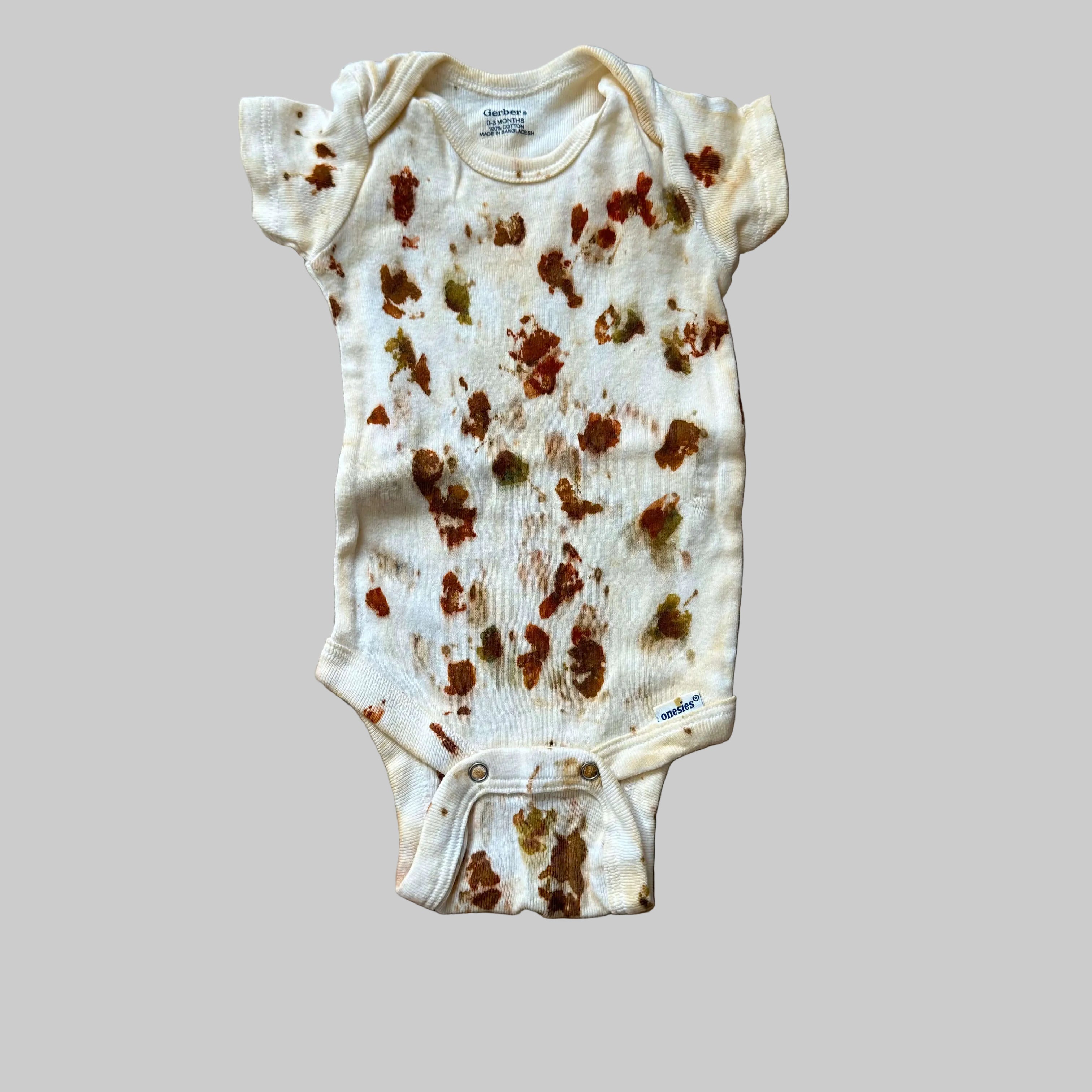 Baby Onsies Dyed With Marigolds and Coreopsis and Weld